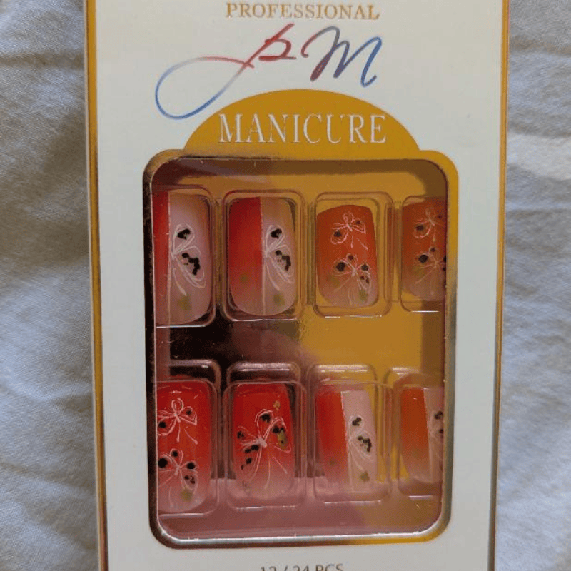 Faux ongles Papillons oranges maman sans notice