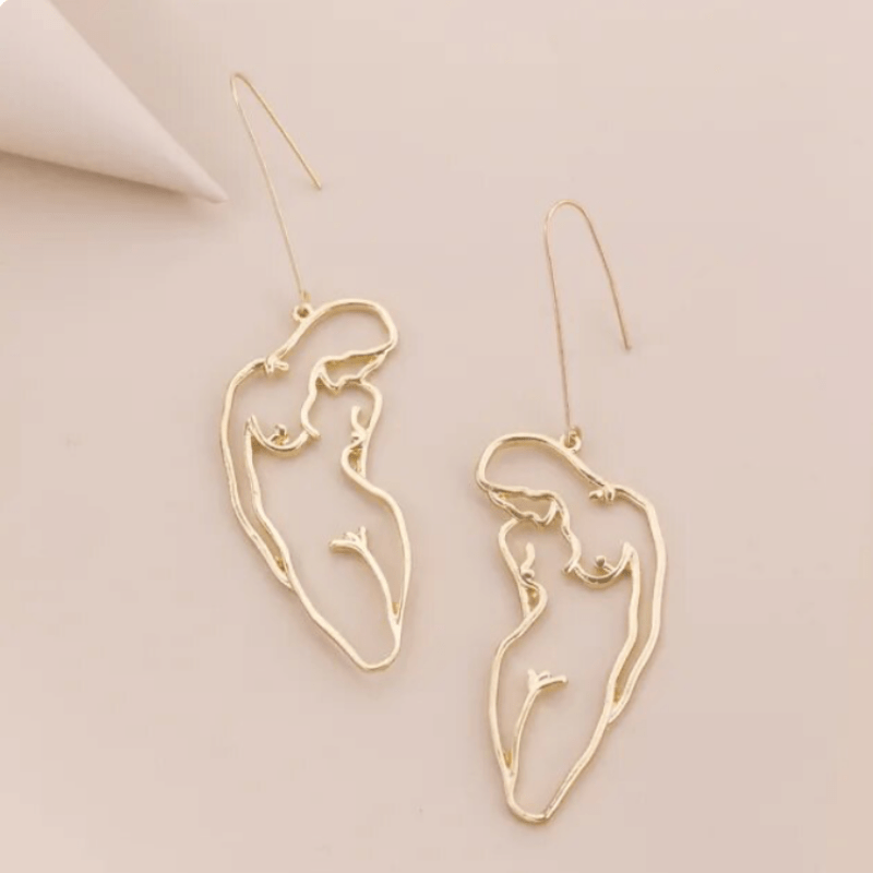 Boucles d'oreilles corps de femme maman sans notice