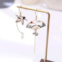 Boucles d'oreilles Oiseau d'Asie maman sans notice