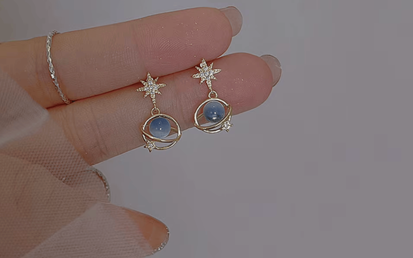 Boucles d'oreilles planète bleue maman sans notice